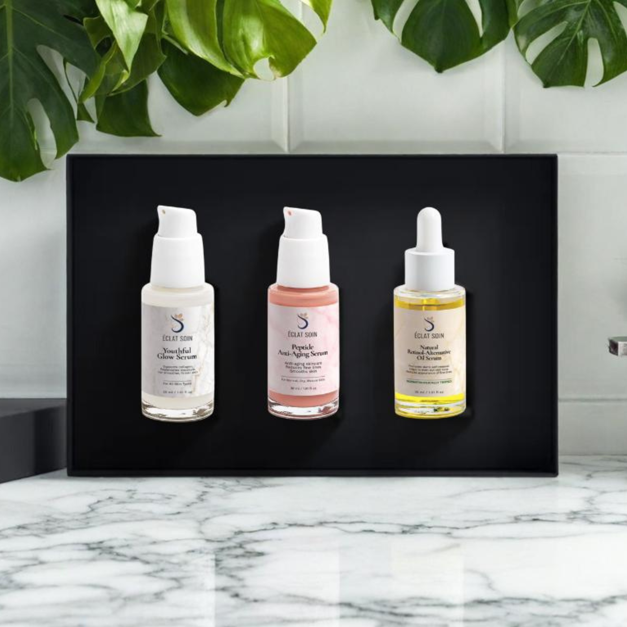 Eclat Soin Boost Serum Skincare Collection Box featuring three nourishing serums